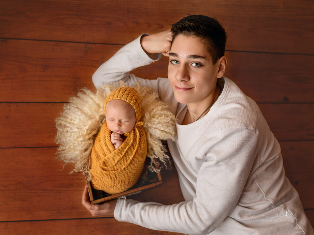 Dlaczego warto wynająć profesjonalnego fotografa noworodkowego
