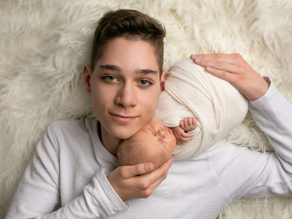 Dlaczego warto wynająć profesjonalnego fotografa noworodkowego