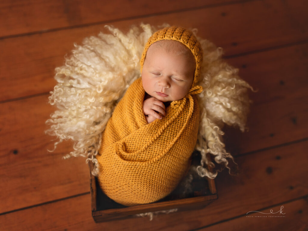 Dlaczego warto wynająć profesjonalnego fotografa noworodkowego