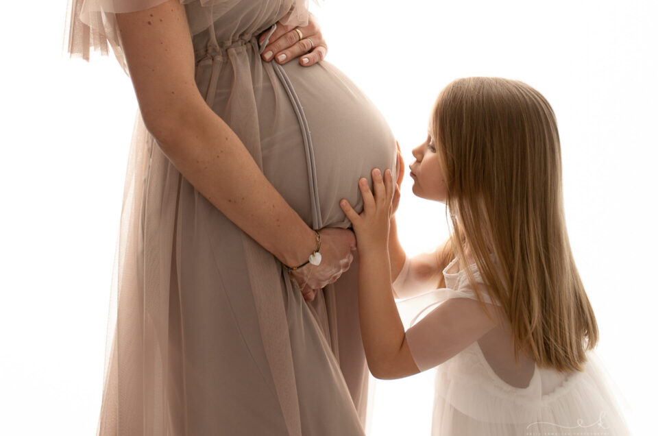 Sesja ciążowa na huśtawce